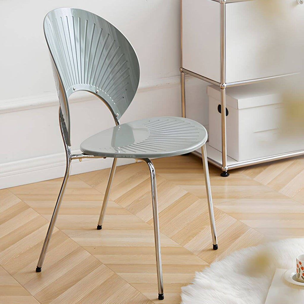 Stackable acrylic dining chair with open back and metal legs, armless design for modern dining rooms