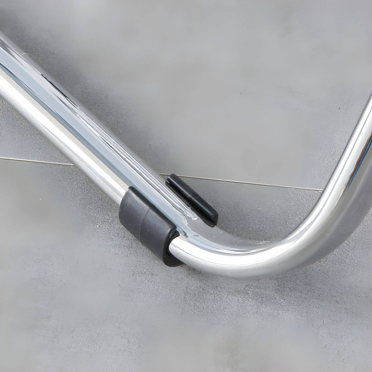 Scandinavian style dining chair with silver metal legs and plastic acrylic seat