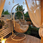 Tropical cocoa and cream upholstered porch swing with alloy frame, stand, and chain included