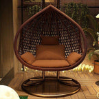 Auburn tropical alloy porch swing with stand, cushions, and chain for outdoor comfort