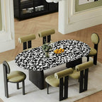 Oval modern dining table with stone top and black wood double pedestal base, 55.1 by 31.5 inches