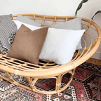 Cozy natural rattan papasan chair available in single or double size for comfortable lounging