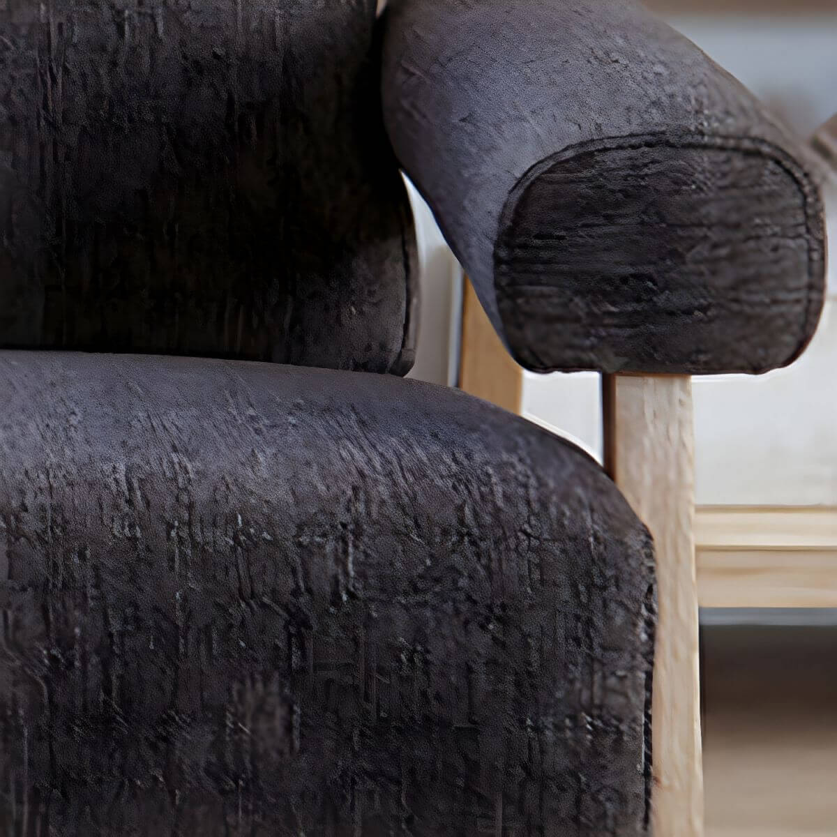 Black Scandinavian style small sofa with wood frame and faux leather upholstery