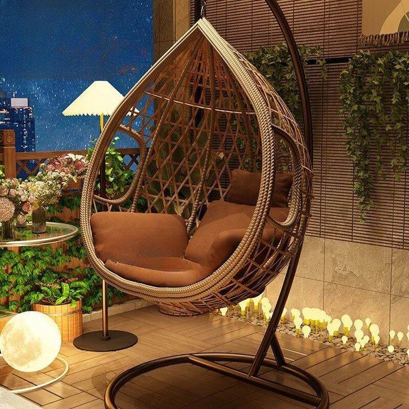 Auburn tropical alloy porch swing with stand, cushions, and chain for outdoor comfort