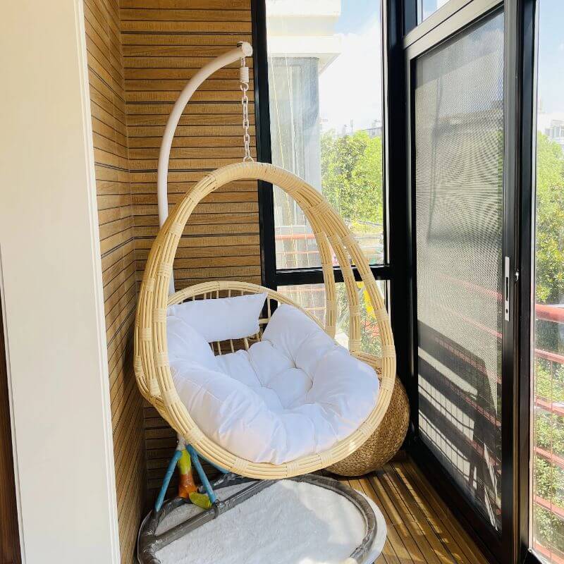 Aluminum porch swing with stand, includes cushions and chain for comfortable outdoor seating