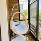 Aluminum porch swing with stand, includes cushions and chain for comfortable outdoor seating