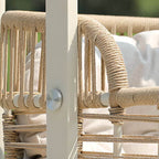 Tropical cocoa and cream upholstered porch swing with alloy frame, stand, and chain included