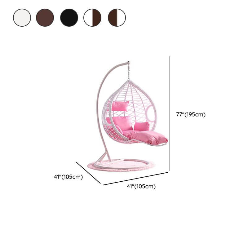 Metal porch swing with cushions, chain, and stand, designed to be heat resistant for outdoor use