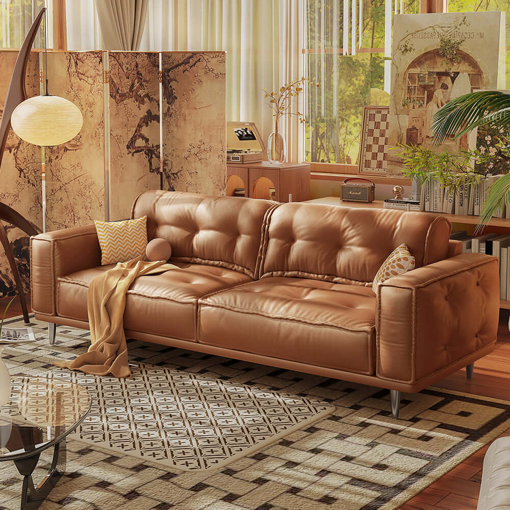 Comfortable French vintage leather sofa with luxurious design and classic style