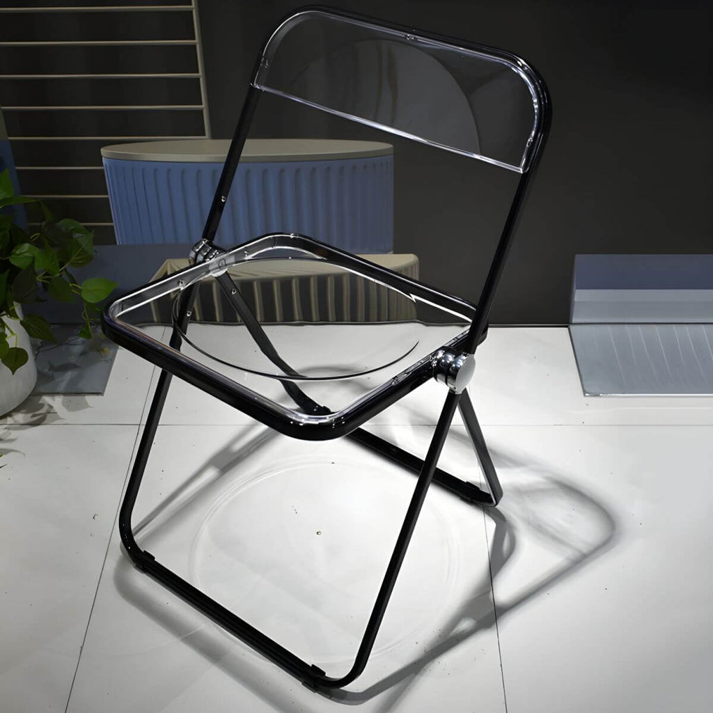Contemporary acrylic folding armless chair with open back, ideal for dining rooms
