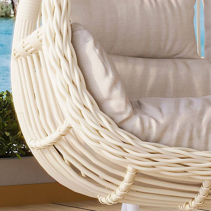 Pink metal 2-seater porch swing with stand, chain, and cushions for outdoor seating