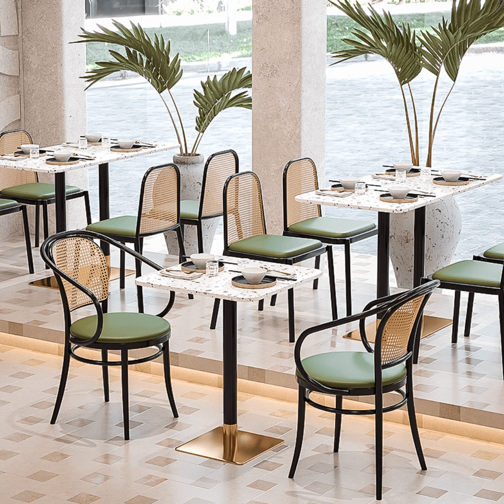Rattan dining chairs with durable terrazzo table for an elegant dining setup main product image