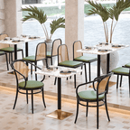 Rattan dining chairs with durable terrazzo table for an elegant dining setup main product image