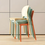 Stackable Scandinavian side chair with open back made of plastic and acrylic for dining
