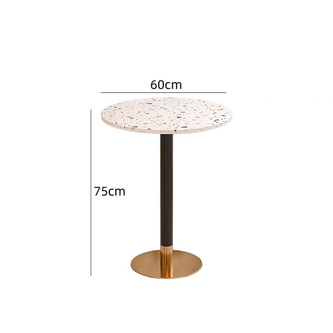 Rattan dining chairs with durable terrazzo table for an elegant dining setup