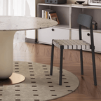 Round terrazzo dining table featuring a stylish wooden and metal base for elegant interiors
