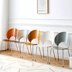 Stackable acrylic dining chair with open back and metal legs, armless design for modern dining rooms