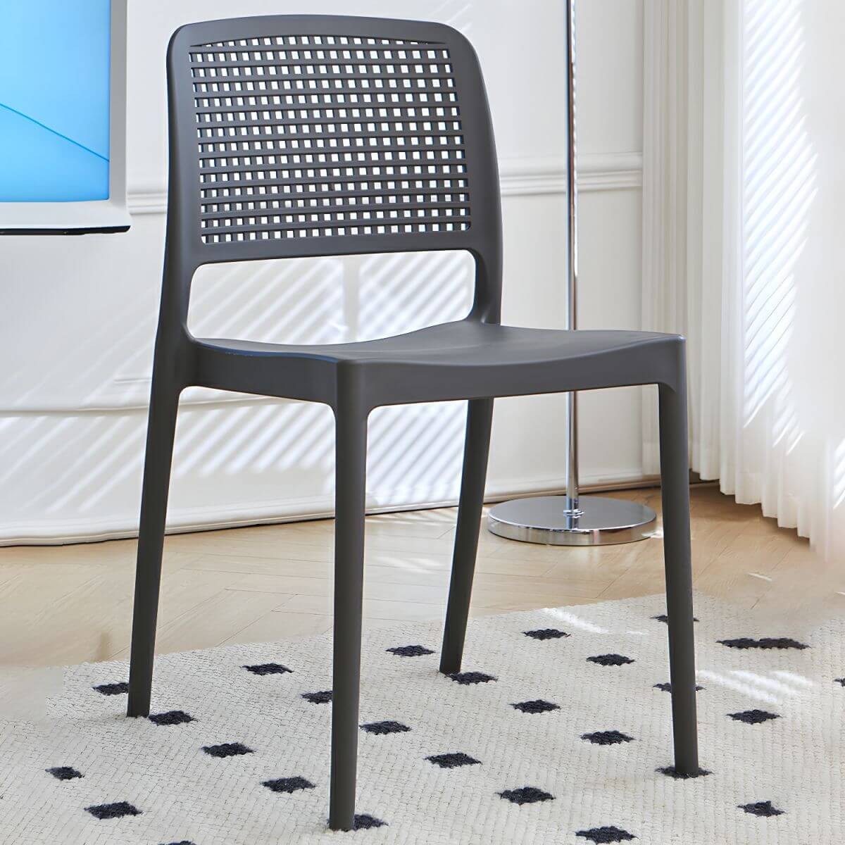 Stackable modern plastic and acrylic side chair for kitchen and dining use