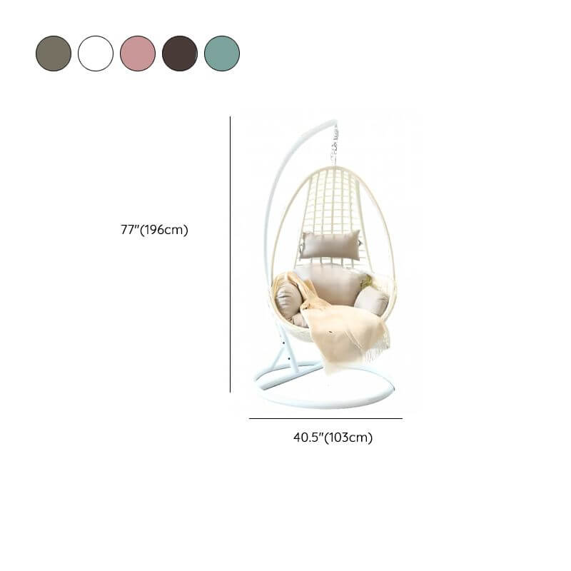 Metal porch swing with tropical olive green, auburn, and rose cushions, includes stand and chain