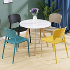 Stackable Scandinavian style plastic and acrylic side chair for dining room