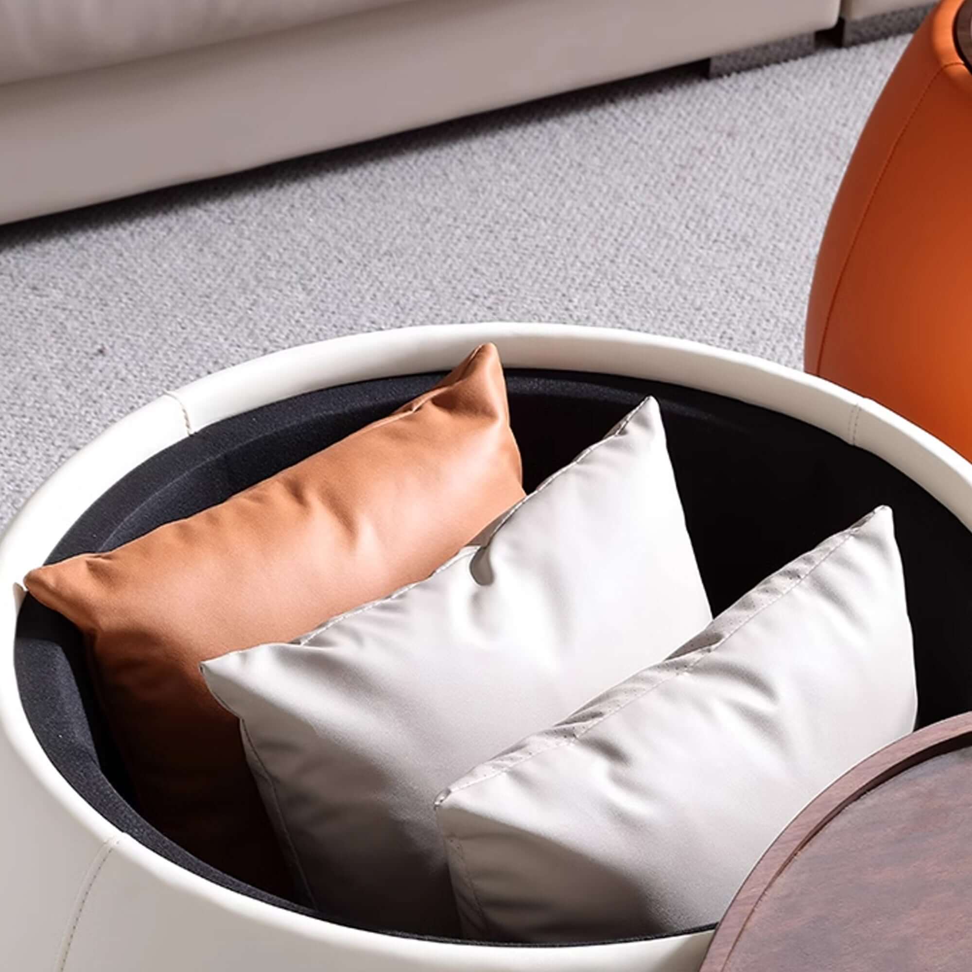 Modern round coffee table with storage, featuring a light luxury design
