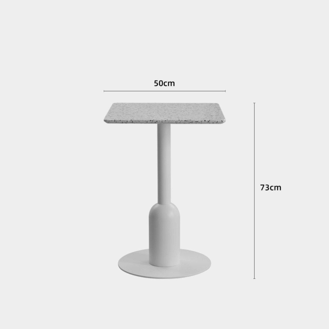 Round terrazzo table ideal for dining or office use with versatile design