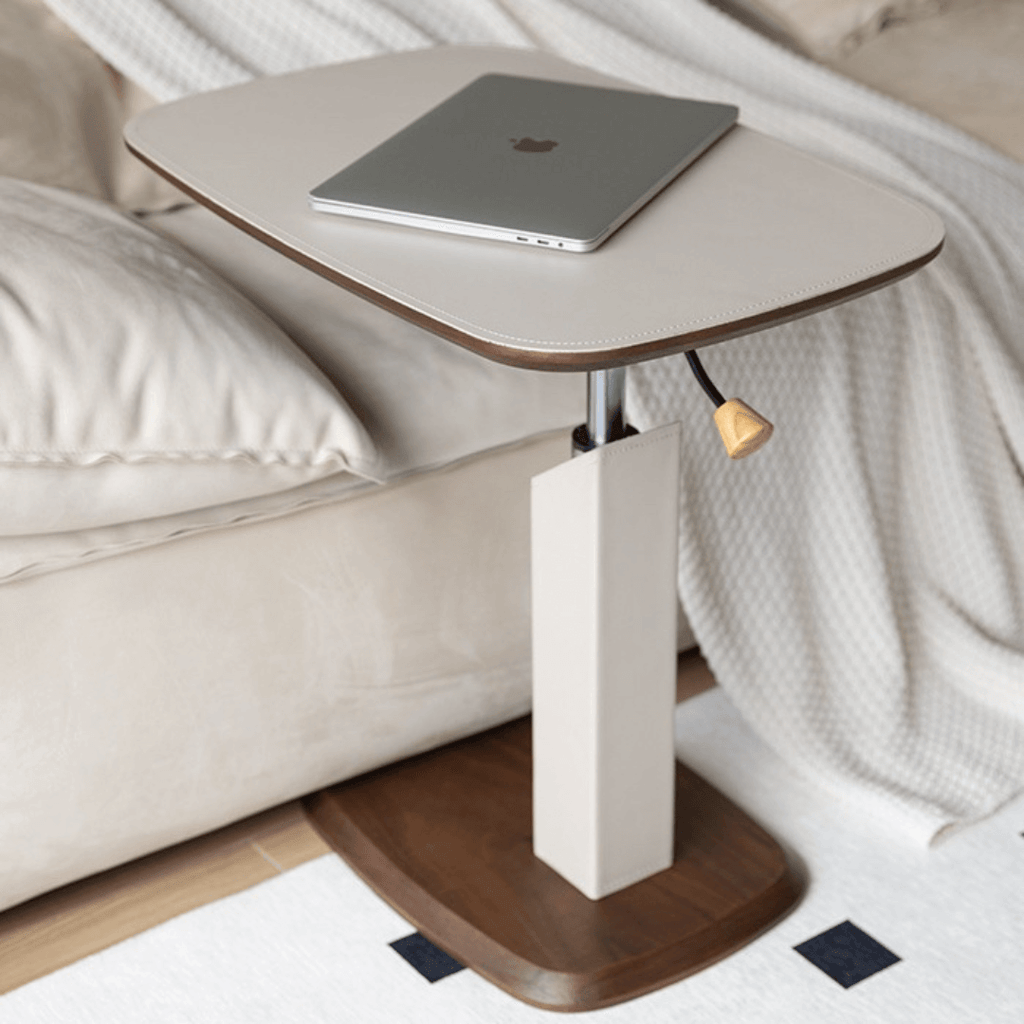 Movable end table in classic beige saddle leather, perfect for cozy living spaces