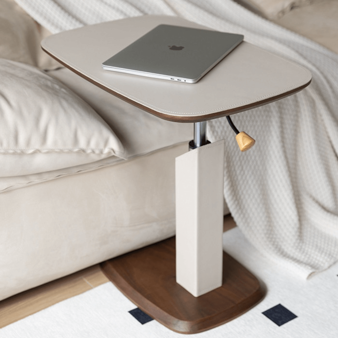 Movable end table in classic beige saddle leather, perfect for cozy living spaces