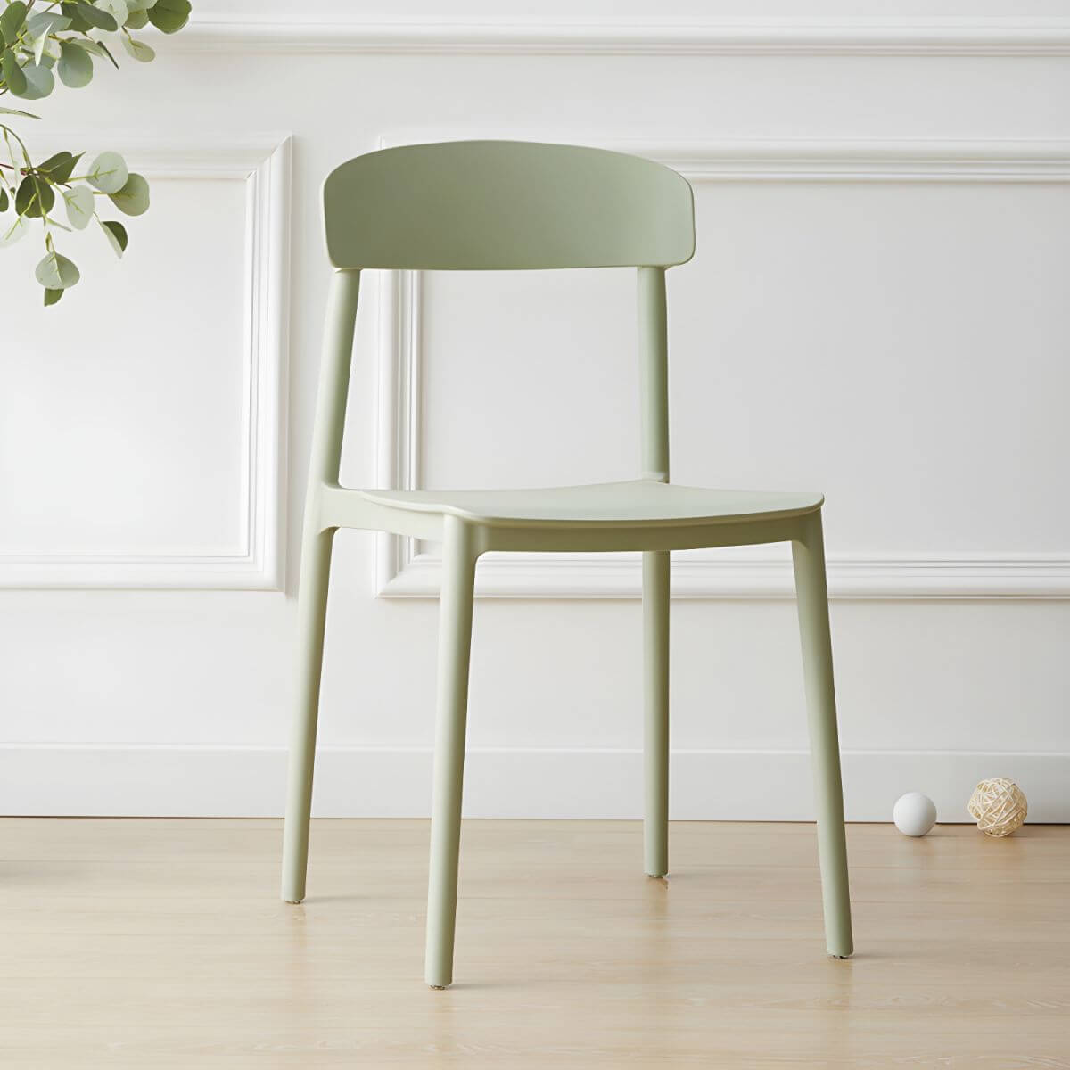 Scandinavian style low back kitchen and dining chair made of plastic and acrylic