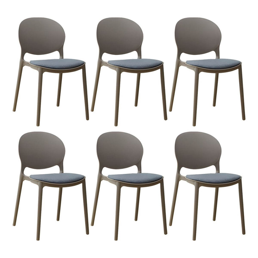 Scandinavian plastic dining chair with open back and four legs, ideal for home use