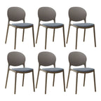 Scandinavian plastic dining chair with open back and four legs, ideal for home use