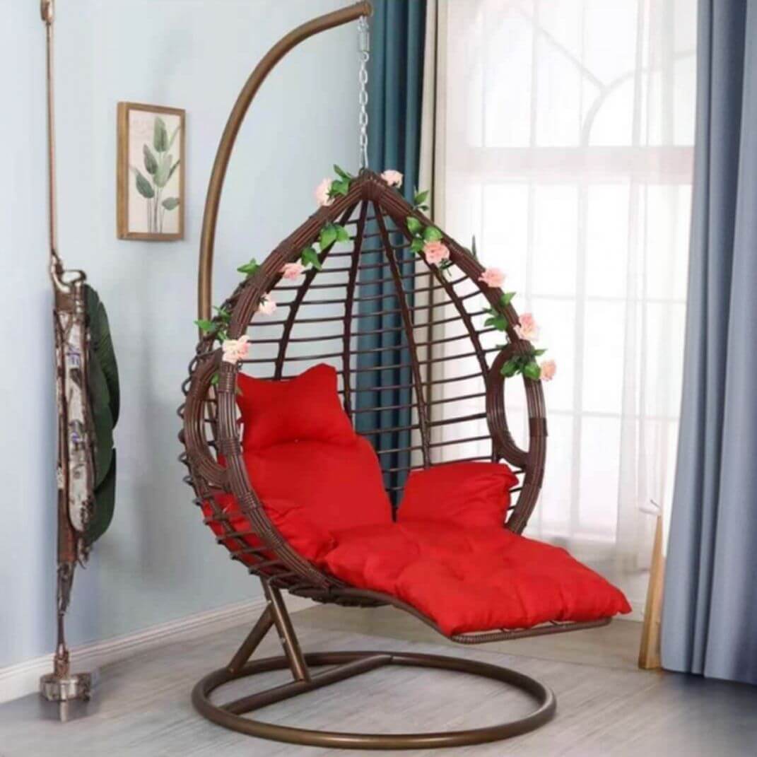 Two-seater metal porch swing egg chair with stand, cushions, and chain included