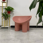 Modern armless papasan accent chair with bowl shape and elephant legs