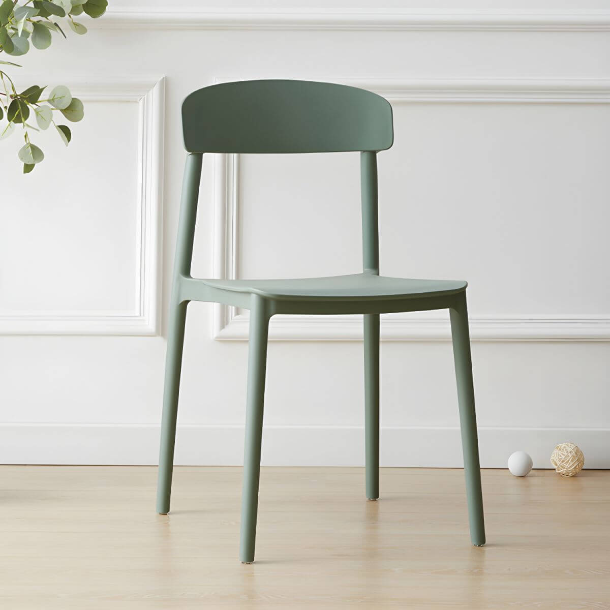Scandinavian style low back kitchen and dining chair made of plastic and acrylic