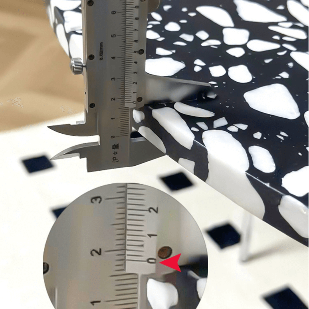 Half-elliptical terrazzo dining table with multicolor mosaic design, durable and stylish