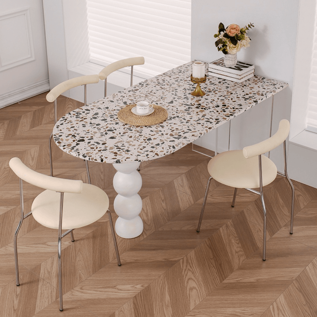 Half-elliptical terrazzo dining table with multicolor mosaic design, durable and stylish