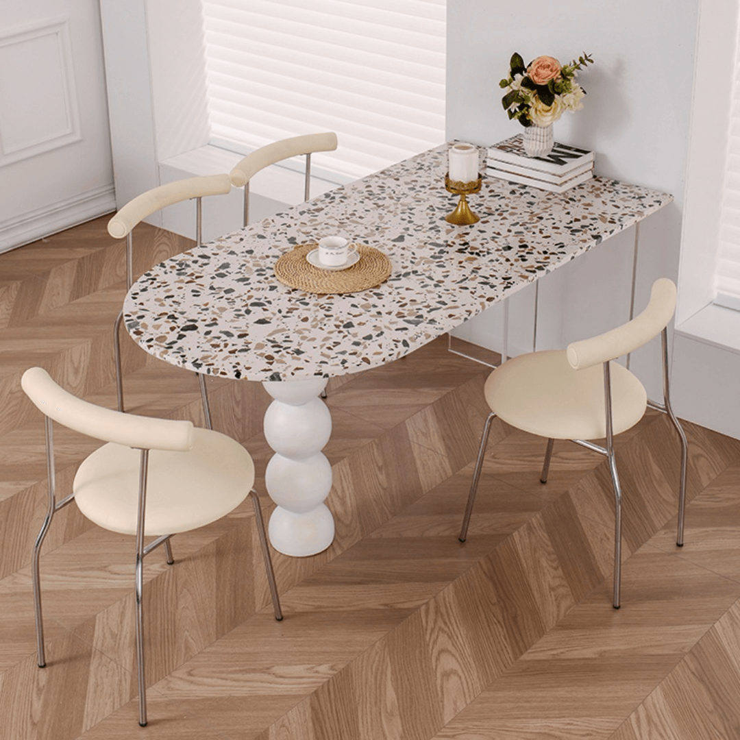 Half-elliptical terrazzo dining table with multicolor mosaic design, durable and stylish