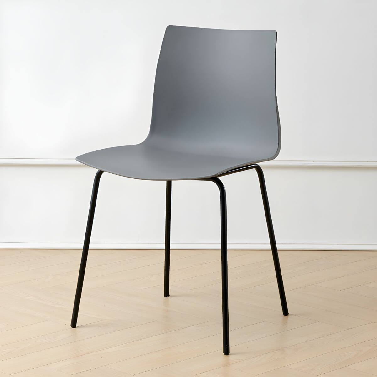 Modern plastic and acrylic side chair with metal legs, ideal for kitchen and dining rooms