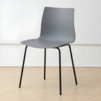 Modern plastic and acrylic side chair with metal legs, ideal for kitchen and dining rooms