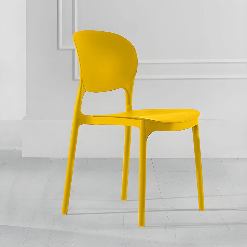 Stackable modern side chair with low back made of plastic and acrylic, perfect for contemporary dining