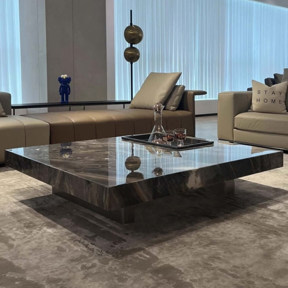 Square coffee table with luxury marbled top and sturdy metal legs