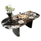 Modern oval black marble dining table with double pedestal base for stylish dining rooms