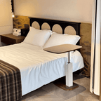 Movable end table in classic beige saddle leather, perfect for cozy living spaces