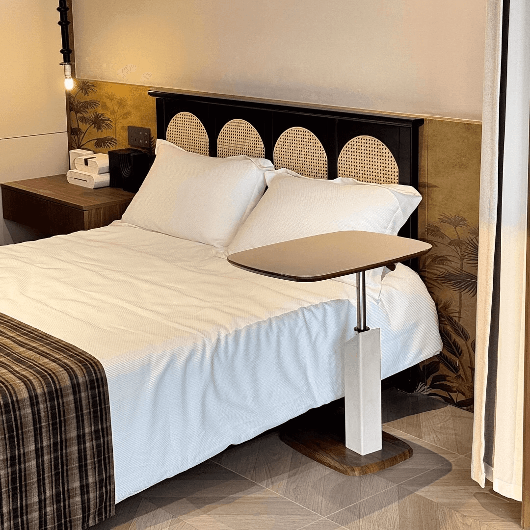 Movable end table in classic beige saddle leather, perfect for cozy living spaces