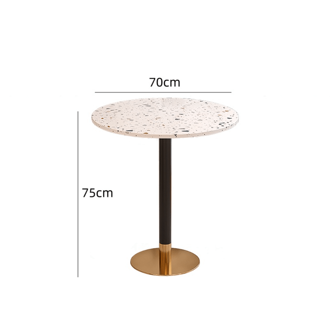 Rattan dining chairs with durable terrazzo table for an elegant dining setup