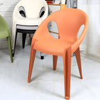 Stackable modern arm chair with open back made of plastic and acrylic for dining