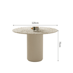 Round terrazzo dining table with soft wool upholstered chairs for a trendy home setup