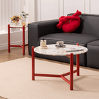 Round side table with vibrant red terrazzo top, featuring a modern minimalist design