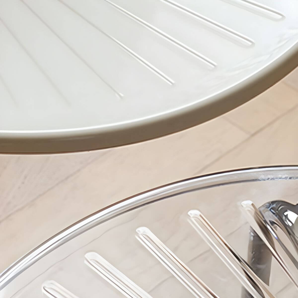 Stackable Scandinavian style dining chair with plastic seat, acrylic back, and silver legs