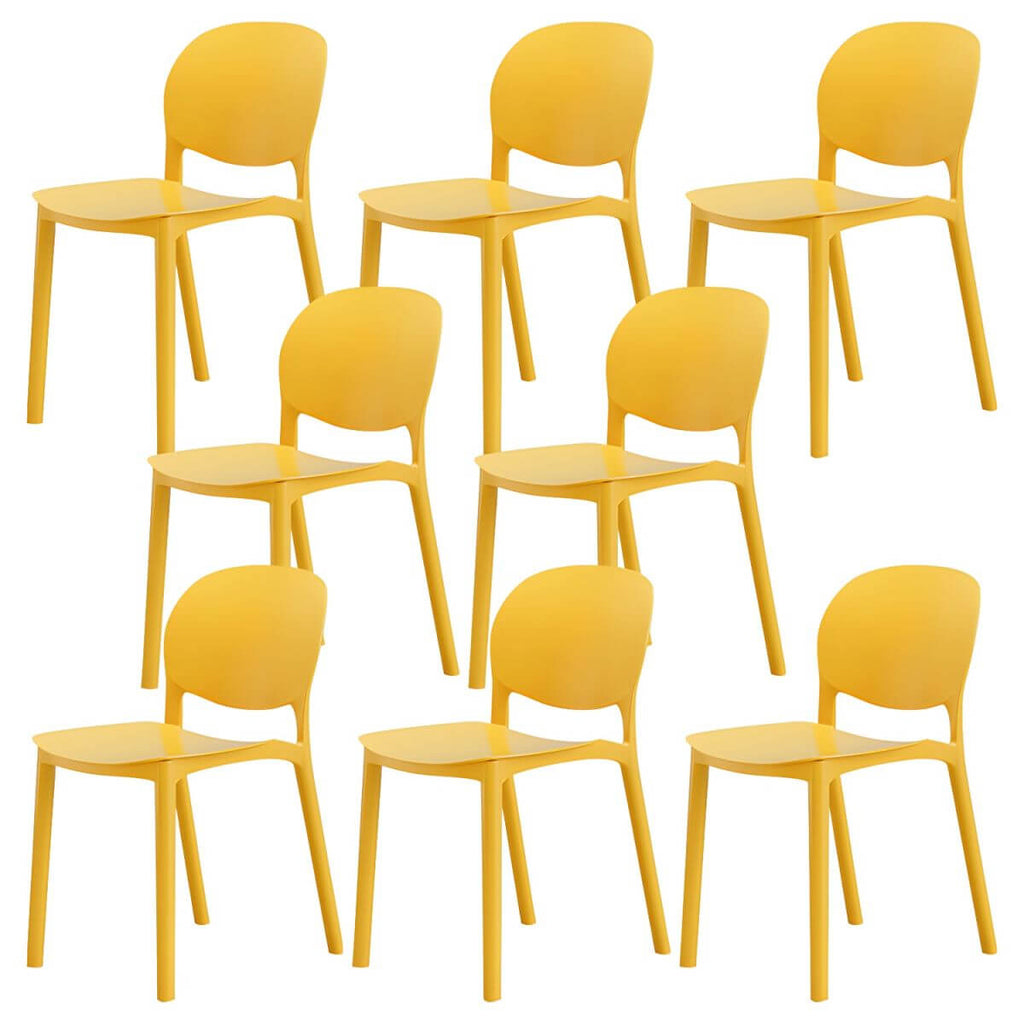 Stackable Nordic dining chair with acrylic legs and ergonomic backrest for modern dining rooms